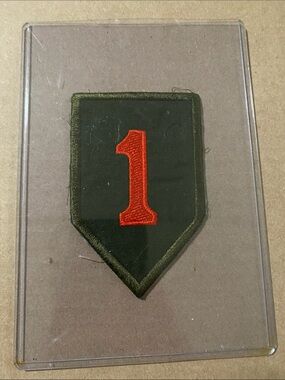 Embroidered WW2 Era Military Patch with Red '1' on Olive Shield